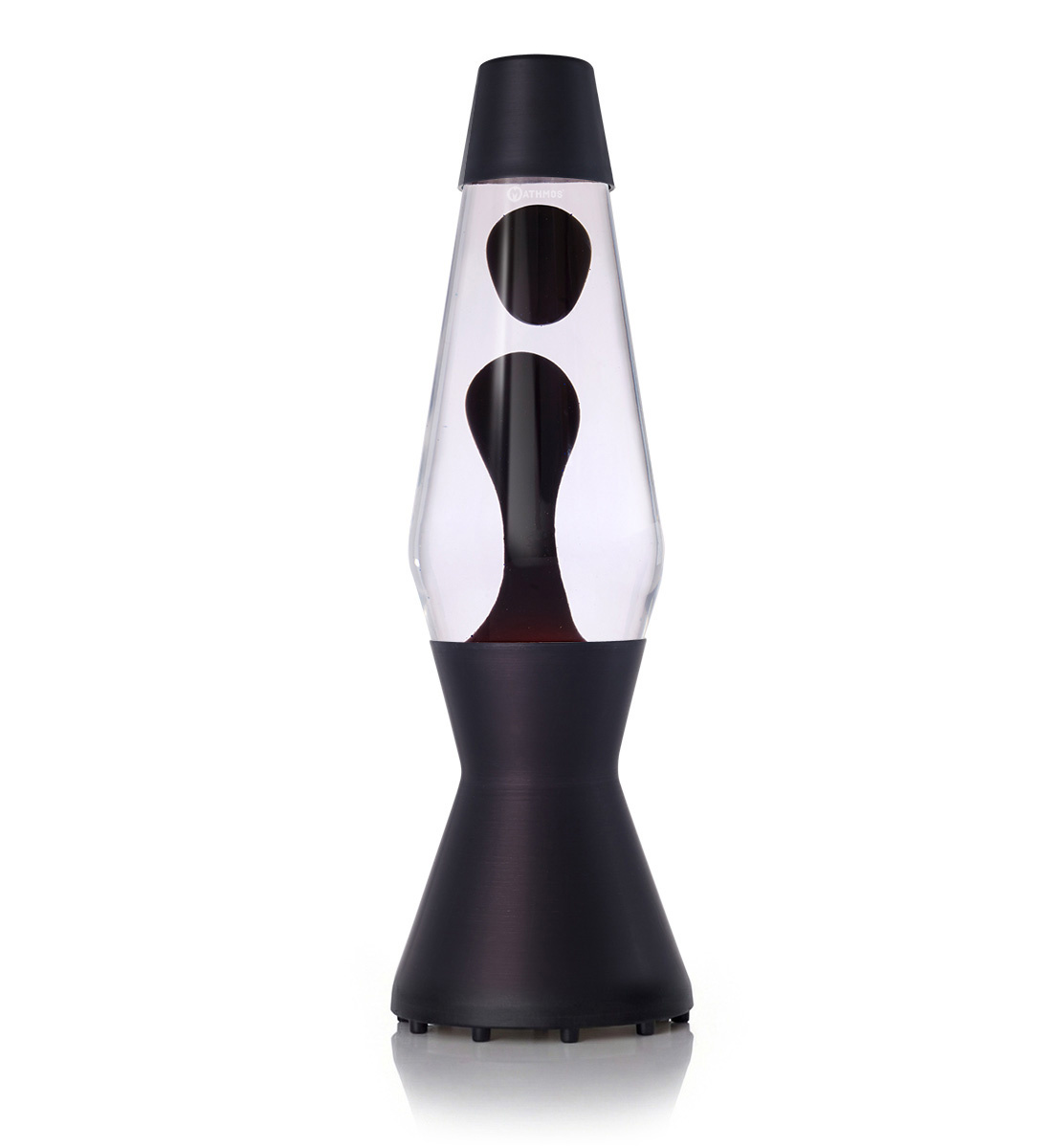 Lampe à lave Mathmos Astro avec lave noire et liquide transparent dans un corps noir sur fond blanc