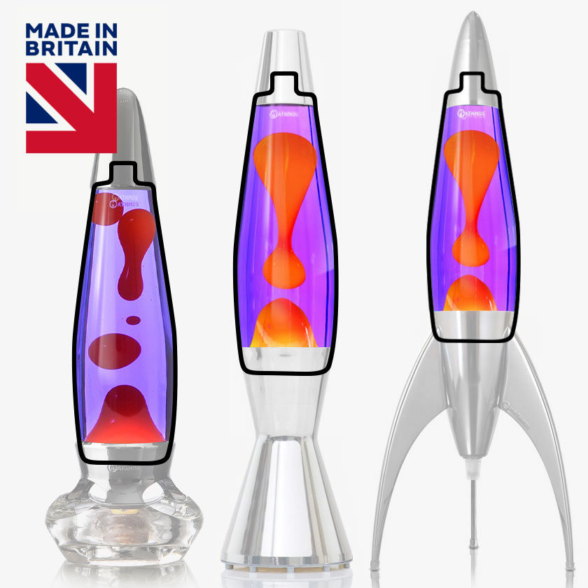 Trois lampes à lave Mathmos Astrobaby, Telstar et Evo avec liquide violet et lave orange dans des corps transparents sur fond blanc