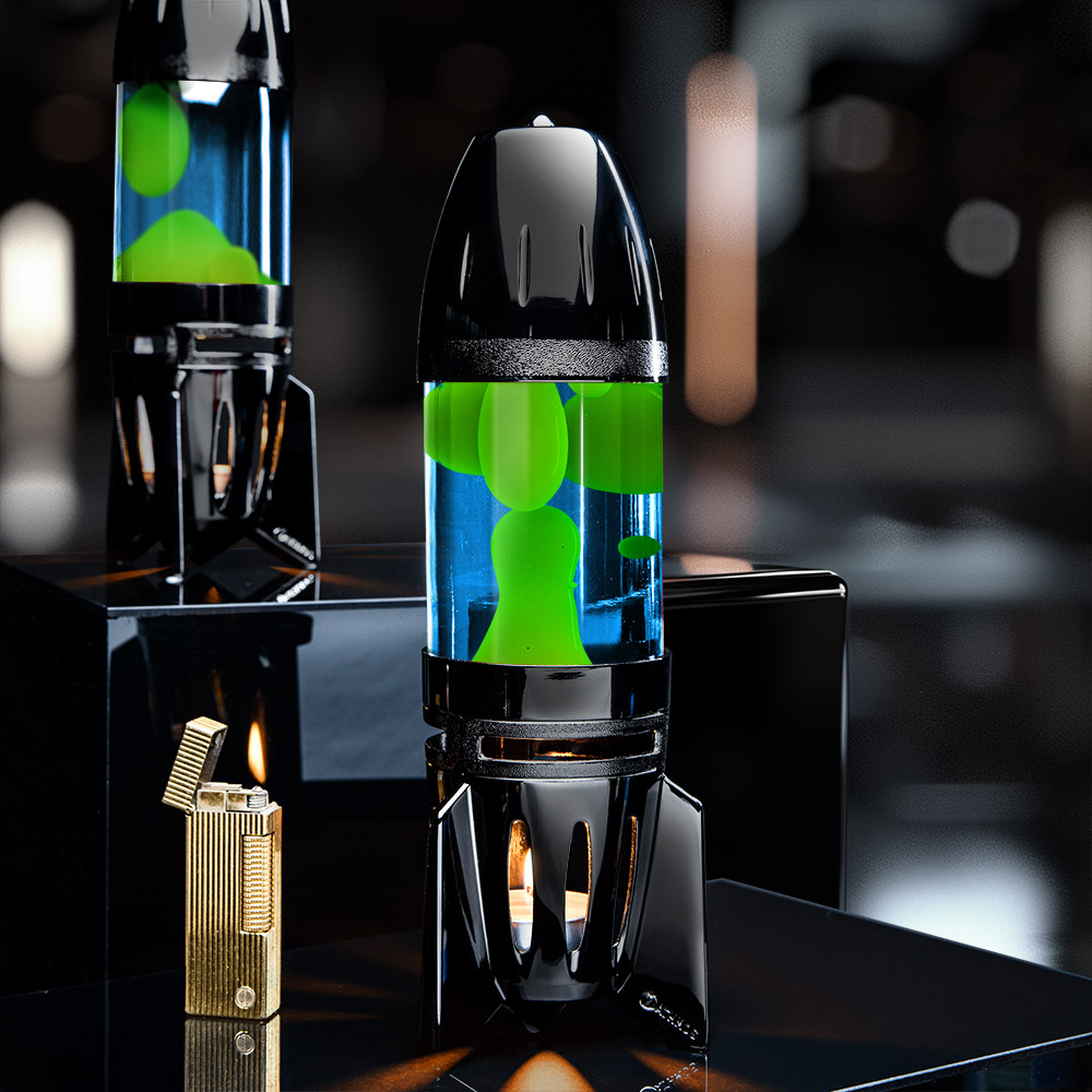 Lampe à lave à bougie noire Mathmos Fireflow avec liquide bleu et lave jaune sur fond sombre