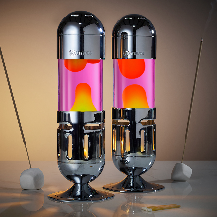 Deux lampes à lave à bougie Mathmos Pod chromées avec liquide rose et lave jaune, lampe à lave charmante