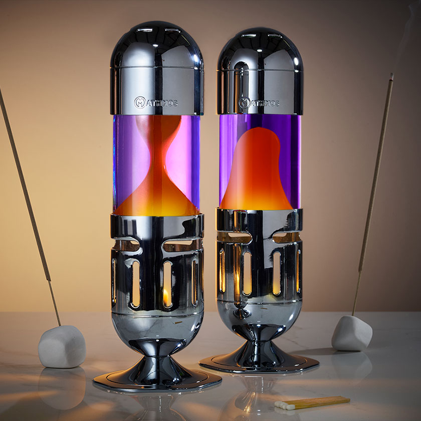 Deux lampes à lave à bougie Mathmos Pod chromées avec liquide violet et lave orange et encens, lampe à lave séduisante