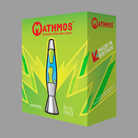 Boîte verte originale de la lampe à lave Mathmos Astro Baby avec l'inscription Made in Britain Since 1963 sur fond gris.