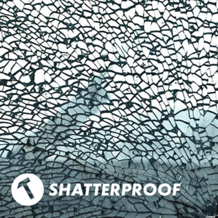 Texture de verre fissuré avec l'inscription « Shatterproof » et une icône de marteau, illustrant le revêtement sûr de la lampe à lave Mathmos Neo.
